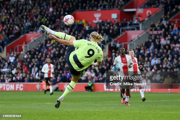 Erling Haaland of Manchester City scores the team's third goal during the Premier League match between Southampton FC and Manchester City at Friends...