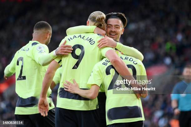 Erling Haaland of Manchester City celebrates with teammates after scoring the team's third goal during the Premier League match between Southampton...