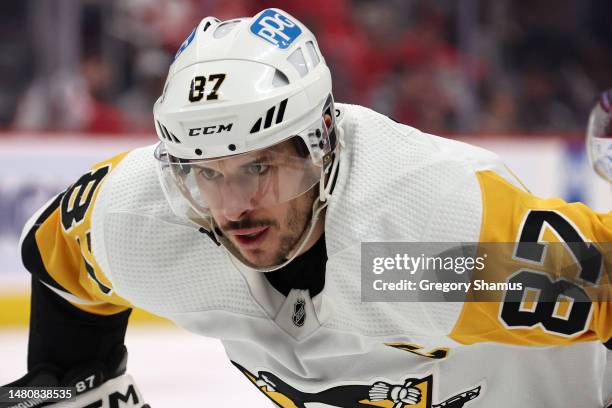 Sidney Crosby of the Pittsburgh Penguins gets ready for a first period face off against the Detroit Red Wings at Little Caesars Arena on April 08,...