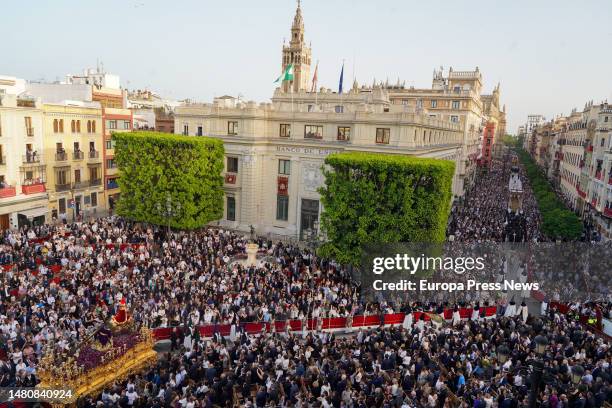 Several pasos participating in the Santo Entierro Grande along the Av de la Constitucion on the way to the Cathedral on April 8, 2023 in Seville....