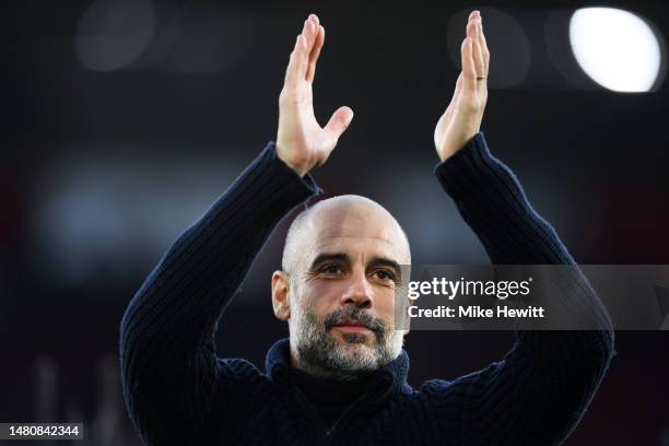 Pep Guardiola, Manager of Manchester City, applauds the fans after the team's victory during the Premier League match between Southampton FC and...