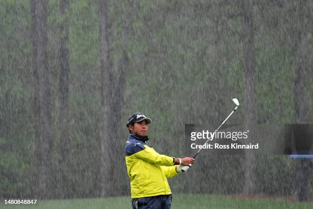 Hideki Matsuyama of Japan plays a shot on the 12th hole during the third round of the 2023 Masters Tournament at Augusta National Golf Club on April...