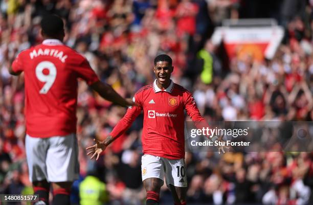 Marcus Rashford of Manchester United celebrates with Anthony Martial after he had scored the second goal during the Premier League match between...