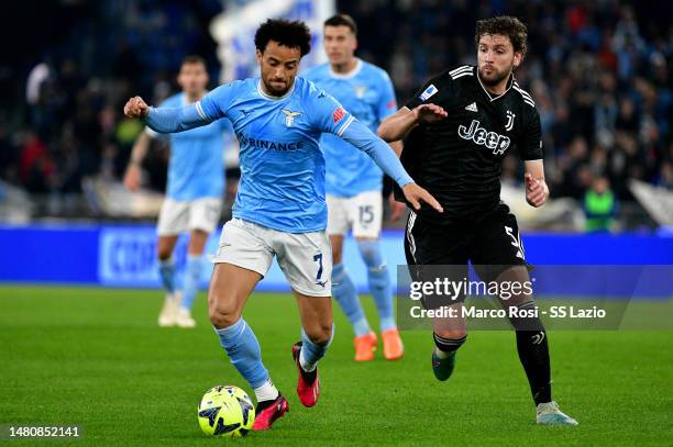 Felipe Anderson of SS Lazio compete for the ball with Manuel Locatelli of Juventus during the Serie A match between SS Lazio and Juventus at Stadio...