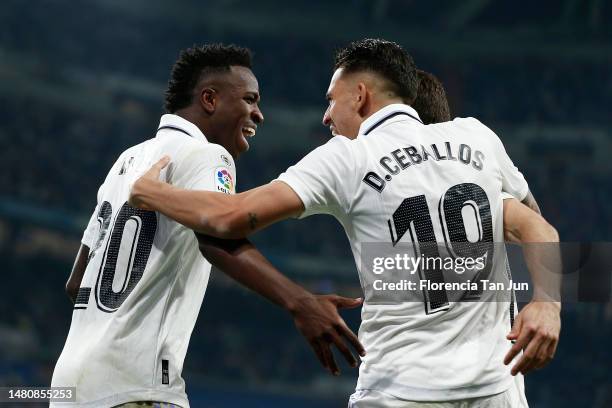 Vinicius Junior of Real Madrid celebrates with team mates after scoring their sides second goal during the LaLiga Santander match between Real Madrid...