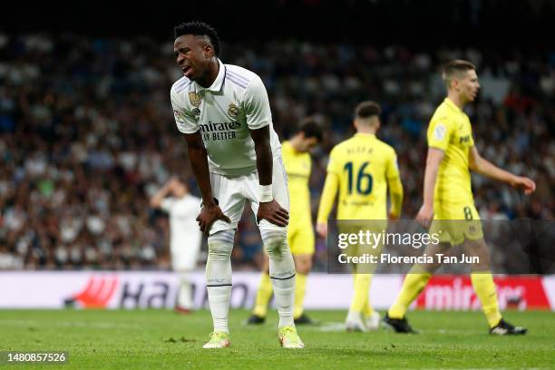 Vinicius Junior of Real Madrid reacts after missing a chance during the LaLiga Santander match between Real Madrid CF and Villarreal CF at Estadio...