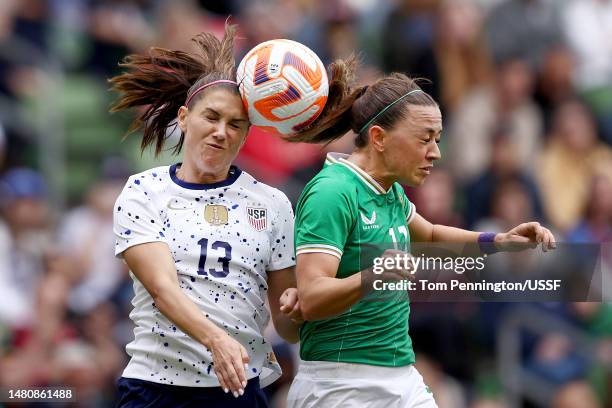 Alex Morgan of the United States heads the ball against Katie McCabe the Republic of Ireland in the second half of a 2023 International Friendly...