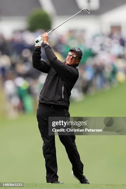 Phil Mickelson of the United States plays his second shot on the first hole during the third round of the 2023 Masters Tournament at Augusta National...