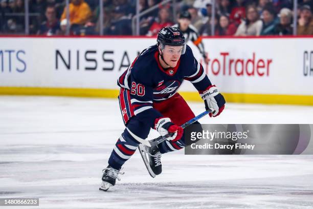 Karson Kuhlman of the Winnipeg Jets follows the play down the ice during first period action against the New Jersey Devils at the Canada Life Centre...