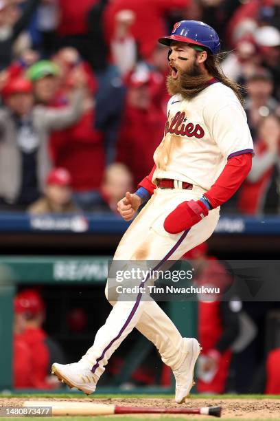 Brandon Marsh of the Philadelphia Phillies scores the winning run during the ninth inning against the Cincinnati Reds at Citizens Bank Park on April...