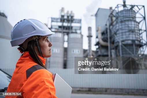 Woman engineer working in power plant.