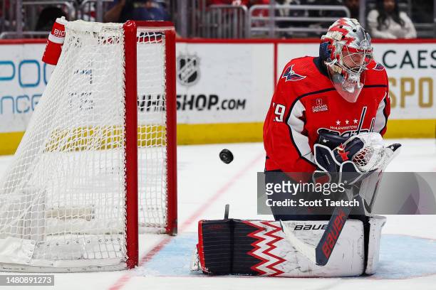 Charlie Lindgren of the Washington Capitals misses the game-winning goal shot by Matthew Tkachuk of the Florida Panthers during the third period of...