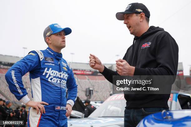 William Byron, driver of the HendrickCars.com Chevrolet, and KBM owner and NASCAR Cup Series driver, Kyle Busch talk prior to the NASCAR Craftsman...