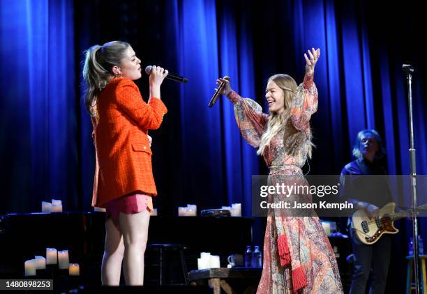 Tenille Arts and LeAnn Rimes perform at the Ryman Auditorium on April 08, 2023 in Nashville, Tennessee.
