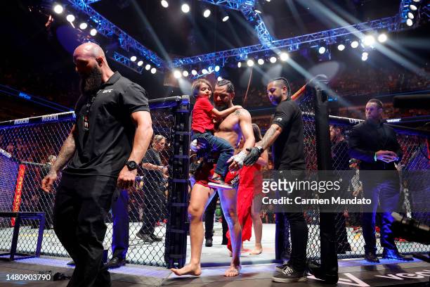Jorge Masvidal exits the octagon after announcing his retirement following his unanimous decision loss to Gilbert Burns of Brazil in their...