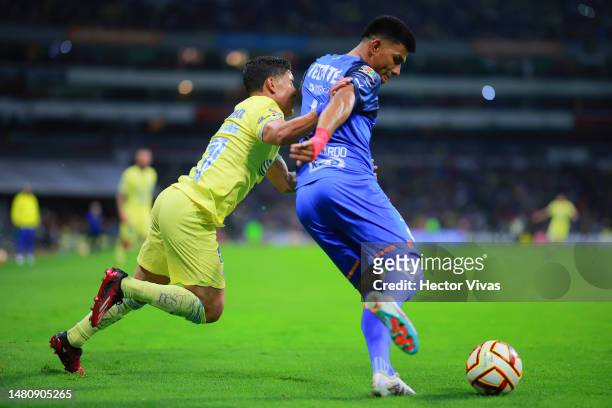 Alejandro Zendejas of America battles for possession with Jesús Gallardo of Monterrey during the 14th round match between America and Monterrey as...