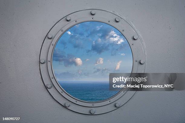 ocean through porthole - bullauge stock-fotos und bilder