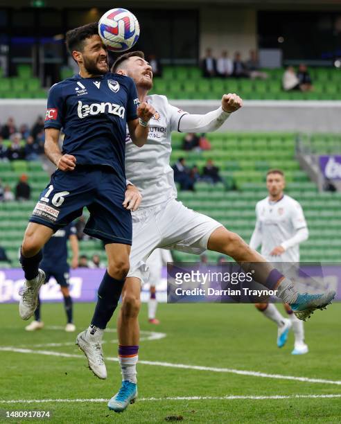 Stefan Nigro of Melbourne Victory heads the ballduring the round 23 A-League Men's match between Melbourne Victory and Perth Glory at AAMI Park, on...