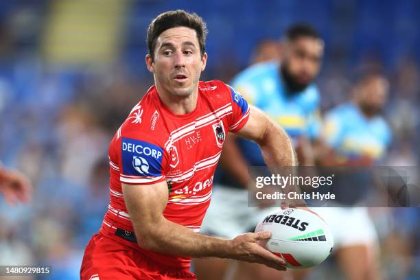 Ben Hunt of the Dragons passes during the round six NRL match between Gold Coast Titans and St George Illawarra Dragons at Cbus Super Stadium on...