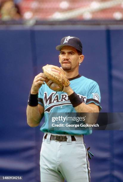 Catcher Benito Santiago of the Florida Marlins looks on from the field before a Major League Baseball game against the Pittsburgh Pirates at Three...