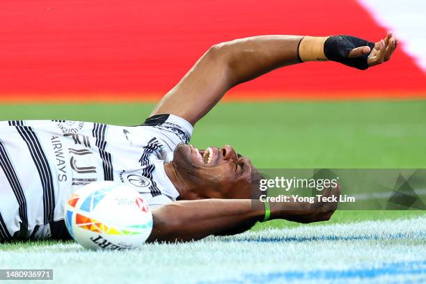 Joseva Talacolo of Fiji celebrates after scoring a try against New Zealand in their cup semifinal match during the HSBC Singapore Rugby Sevens at the...