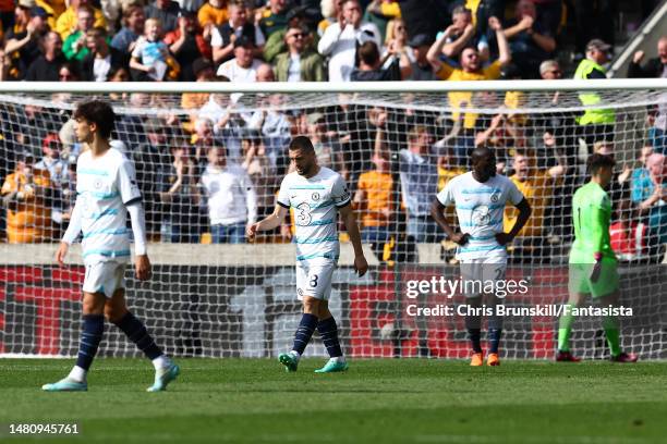 Chelsea players look dejected following the opening goal during the Premier League match between Wolverhampton Wanderers and Chelsea FC at Molineux...