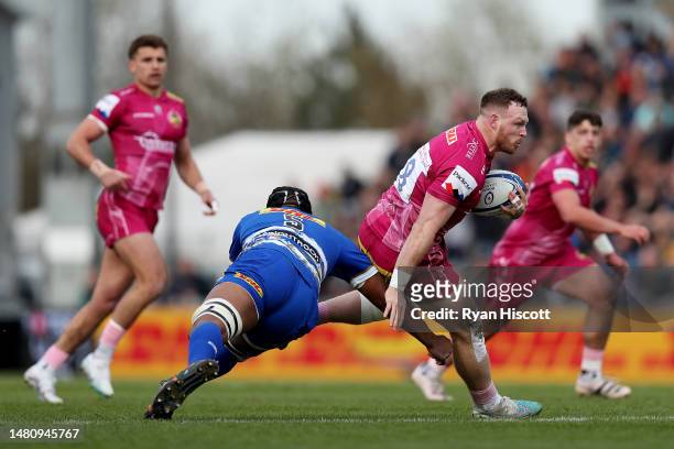 Sam Simmonds of Exeter Chiefs is challenged by Marvin Orie of DHL Stormers during the Heineken Champions Cup Quarter Finals match between Exeter...