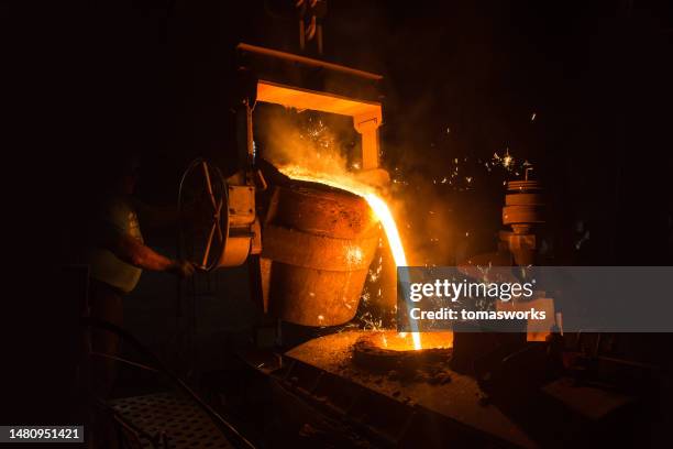 metal furnace and melted iron casting - casting stock pictures, royalty-free photos & images