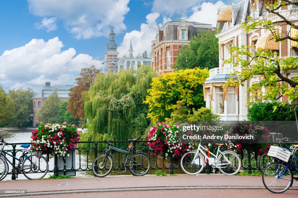 Bridge over an Amsterdam Canal in a Sunny Day with Clear Sky.