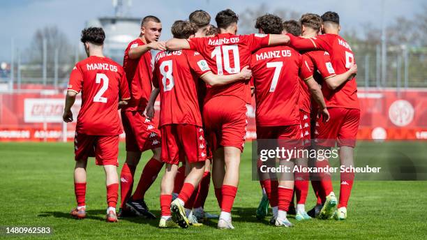 Nelson Weiper of Mainz 05 celebrates his side's first goal with his teammates during the A juniors german championship semi final leg one match...