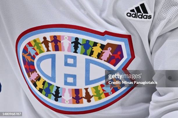 Closeup view of the Montreal Canadiens' logo celebrating Pride Night during warm-ups prior to the game against the Washington Capitals at Centre Bell...