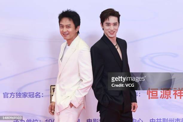 Actors Deng Chao and Xu Weizhou arrive at the red carpet for the Ceremony of Chinese Movie Data on April 9, 2023 in Jingzhou, Hubei Province of China.