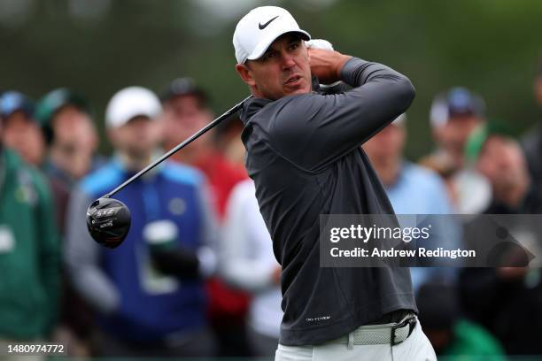 Brooks Koepka of the United States plays his shot from the eighth tee during the continuation of the weather delayed third round of the 2023 Masters...