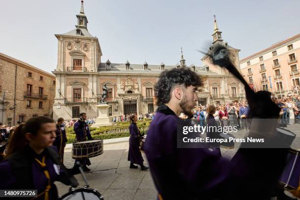 Several people play in a tamborrada maña that heads towards the Plaza Mayor, in Madrid, Spain. This Easter Tamborrada, in charge of the Cofradia La...