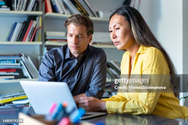 business partners in meeting. - boardroom stock pictures, royalty-free photos & images