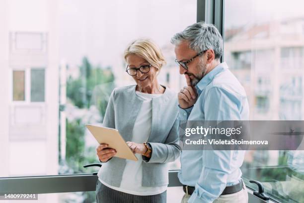 business people in the office. - couple at bank stock pictures, royalty-free photos & images