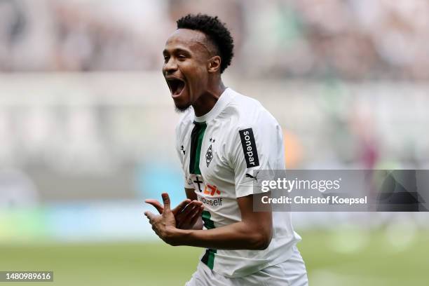 Nathan Ngoumou of Borussia Moenchengladbach celebrates after scoring the team's first goal during the Bundesliga match between Borussia...