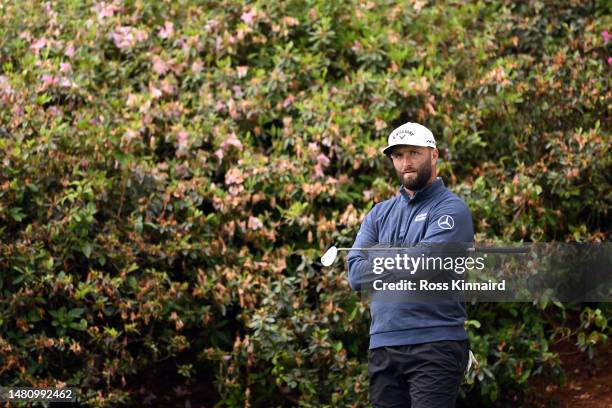 Jon Rahm of Spain looks on from the 13th green during the continuation of the weather delayed third round of the 2023 Masters Tournament at Augusta...