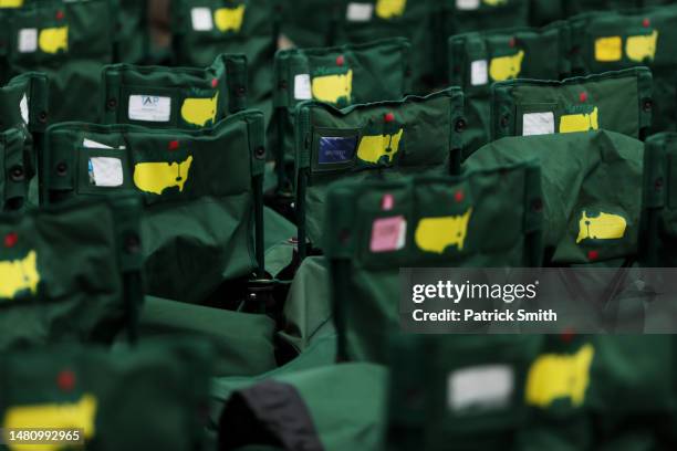 Detail of chairs on the 18th green during the continuation of the weather delayed third round of the 2023 Masters Tournament at Augusta National Golf...