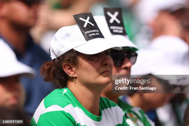 Fans of Real Betis wear Black Cards which read "Prohibido Hablar"/"Forbidden To Speak", which will be raised in the 10th Minute as Sergio Canales of...