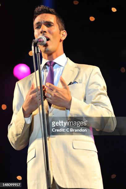 Ari Shapiro of Pink Martini performs on stage for Kew The Music at Kew Gardens on July 5, 2012 in London, United Kingdom.