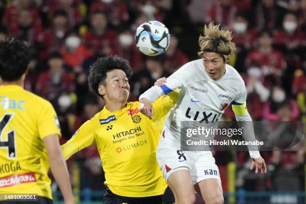 Shoma Doi of Kashima Antlers and Keiya Shiihashi of Kashiwa Reysol compete for the ball during the J.LEAGUE Meiji Yasuda J1 7th Sec. Match between...