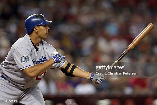 Juan Rivera of the Los Angeles Dodgers bats against the Arizona Diamondbacks during the MLB game at Chase Field on July 5, 2012 in Phoenix, Arizona....