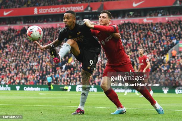 Gabriel Jesus of Arsenal controls the ball whilst under pressure from Andrew Robertson of Liverpool during the Premier League match between Liverpool...
