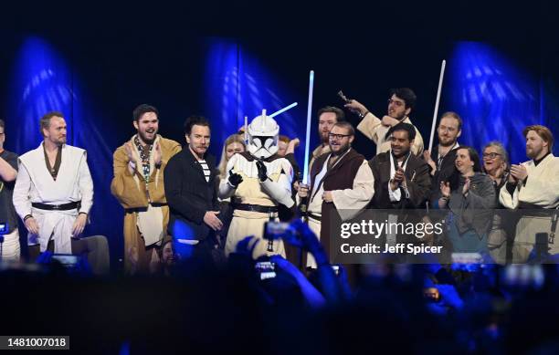 Ewan McGregor with fans on stage during the Obi-Wan Kenobi panel at Star Wars Celebration in London at ExCel on April 09, 2023 in London, England.