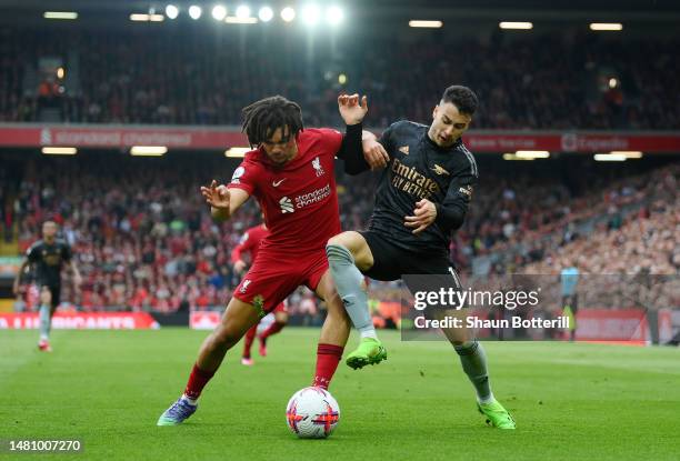 Trent Alexander-Arnold of Liverpool challenges Gabriel Martinelli of Arsenal during the Premier League match between Liverpool FC and Arsenal FC at...