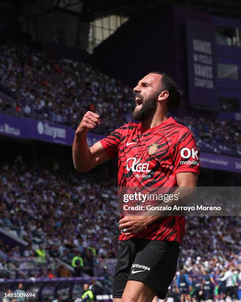 Vedat Muriqi of RCD Mallorca celebrates scoring their opening goal during the LaLiga Santander match between Real Valladolid CF and RCD Mallorca at...