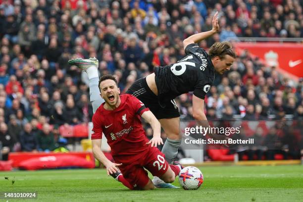 Diogo Jota of Liverpool is fouled by Rob Holding of Arsenal leading a penalty being awarded during the Premier League match between Liverpool FC and...