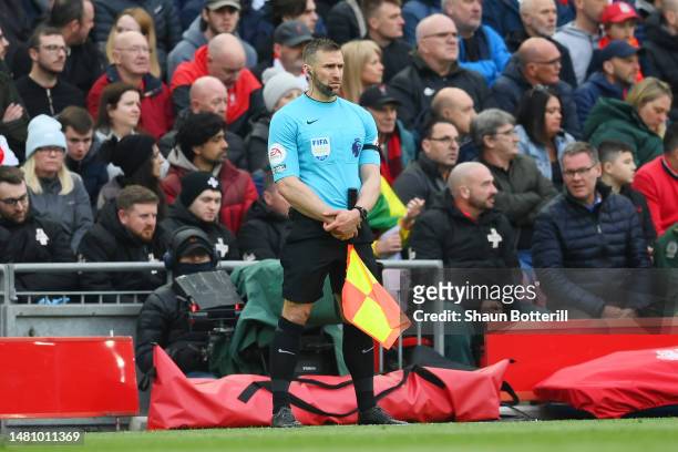 Assistant Referee Constantine Hatzidakis looks on during the Premier League match between Liverpool FC and Arsenal FC at Anfield on April 09, 2023 in...