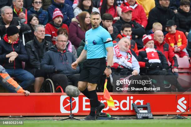 Assistant Referee Constantine Hatzidakis looks on during the Premier League match between Liverpool FC and Arsenal FC at Anfield on April 09, 2023 in...